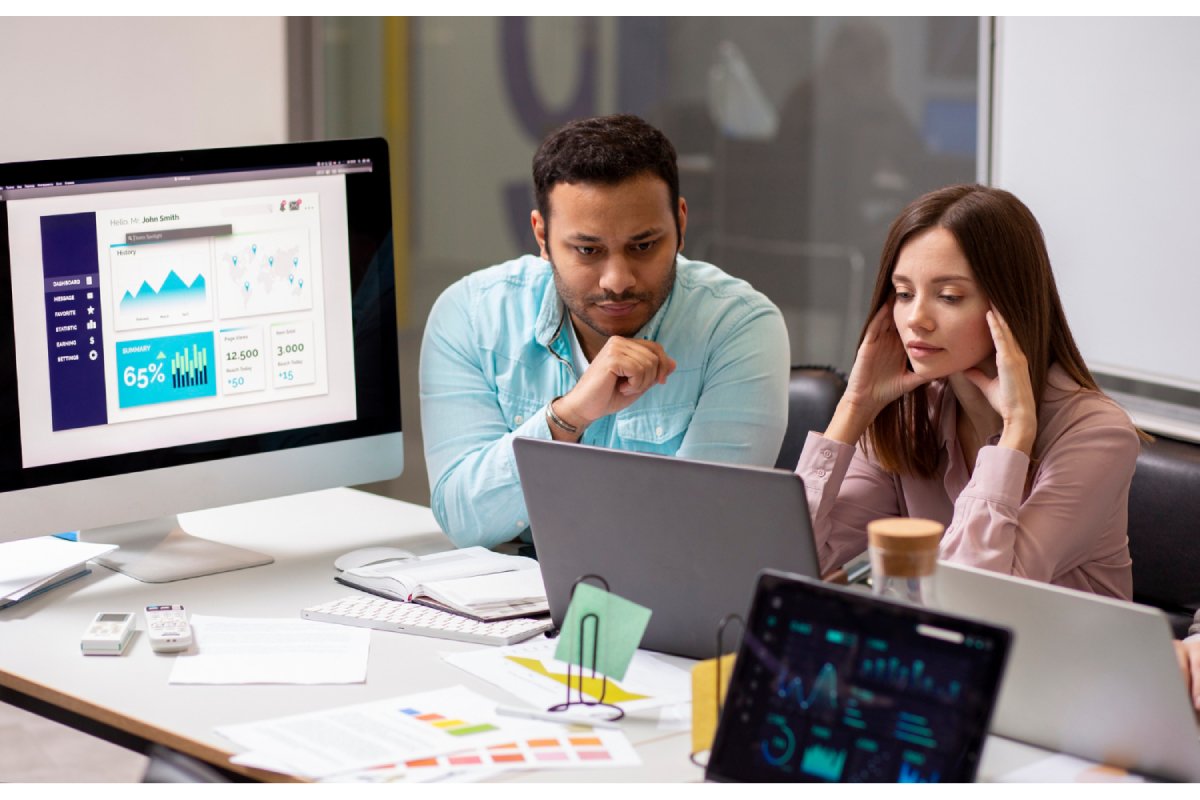 Financial team reviewing analytics dashboard