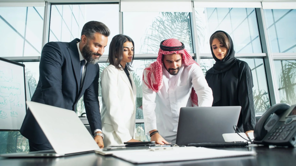Leadership team aligning strategy and execution in Dubai office